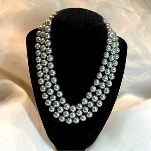 Beautiful layered silver pearl choker by Kenneth Jay Lane.